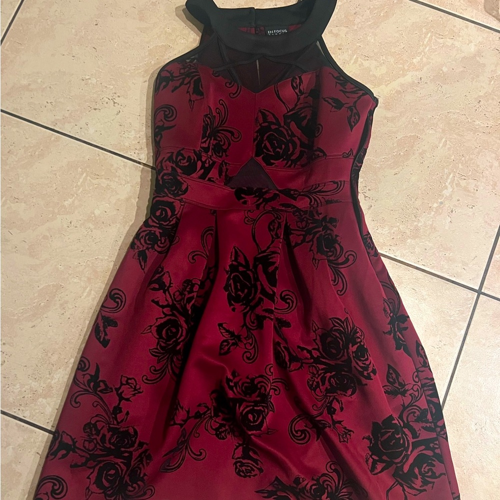 Burgundy dress with black rose print.